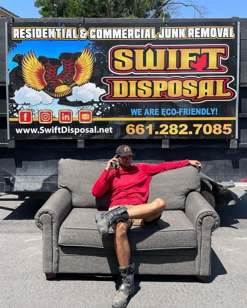 Swift Disposal branded junk removal and dumpster truck in Bakersfield, California